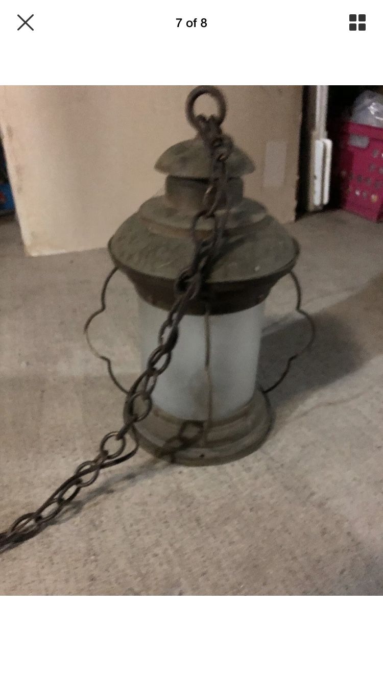 Vintage lantern lamp from boat converted into chandelier