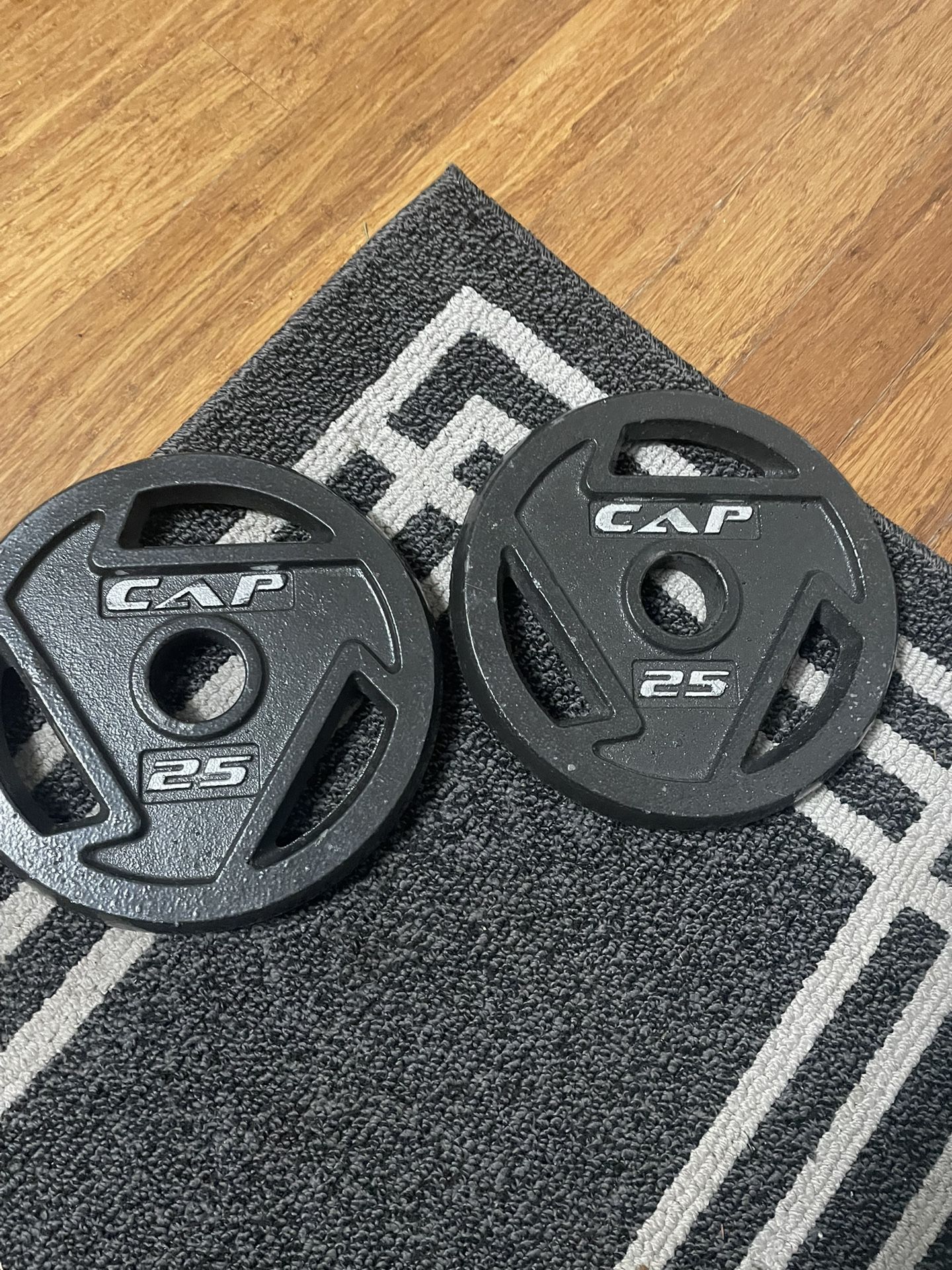 CAP weight plates iron Olympic size 25lbs x 2