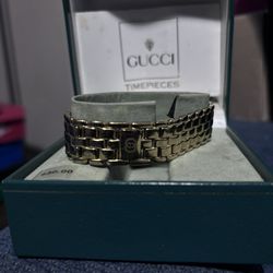 Gold Gucci Watch