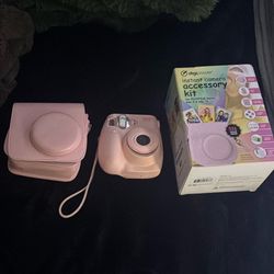 Pink mini polaroid camera 