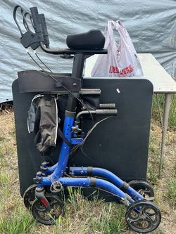 Walker with arm rests