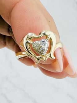 Real 10K Gold Dolphin Heart Ring  Beautiful dolphin and heart ring in yellow and white gold.  Real 10K gold  Yellow and white gold design  White cubic
