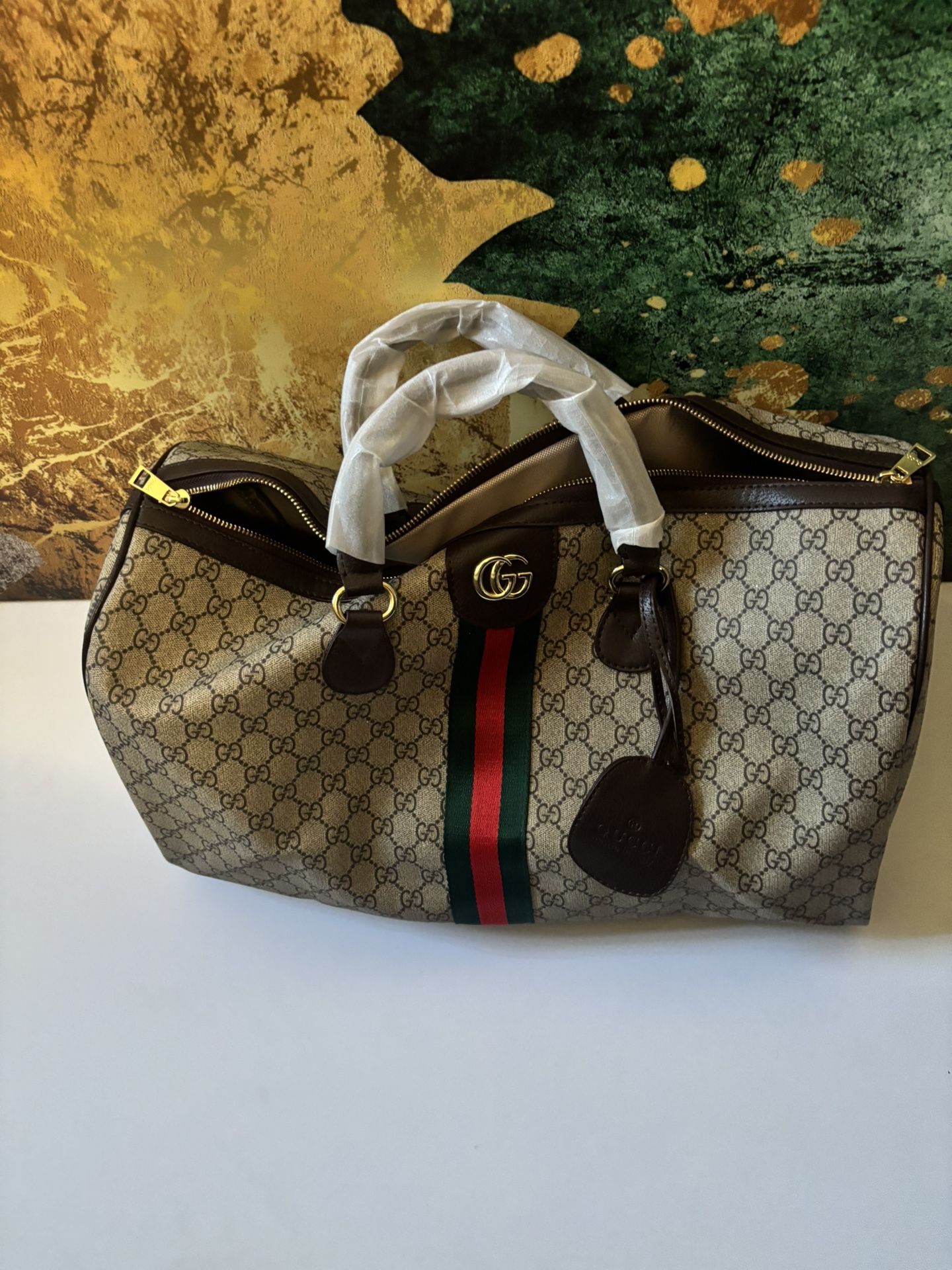 Gucci Duffle Bag.