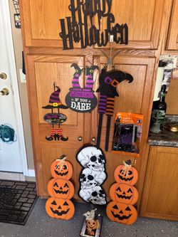 Halloween hanging decorations and a 7" porcelain figurine
