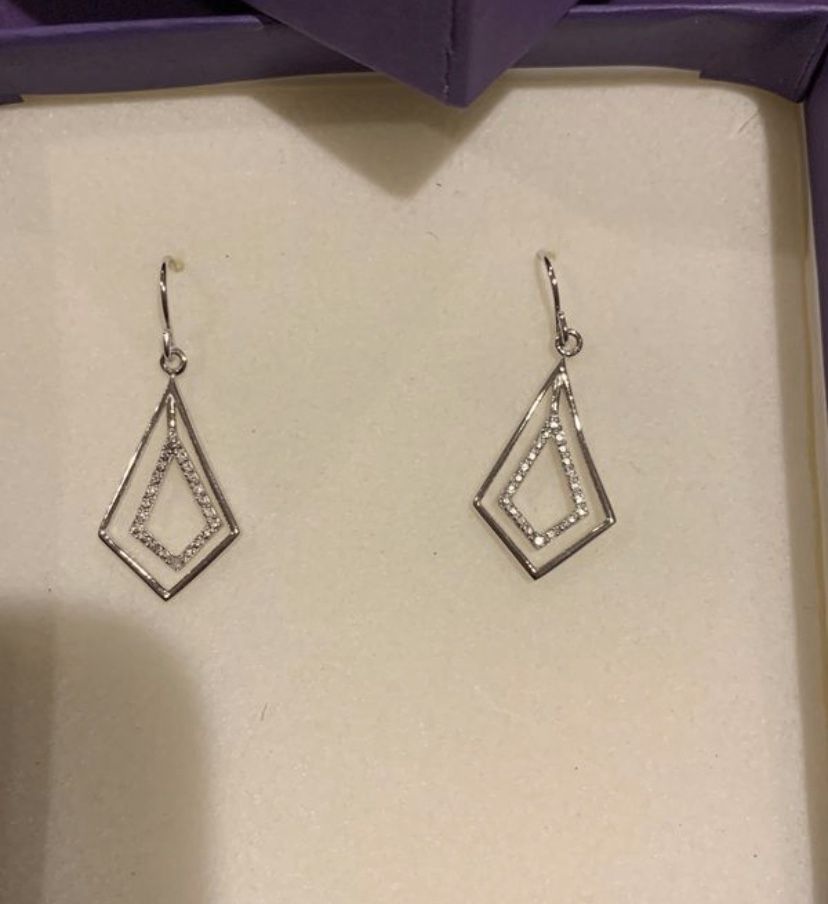 .03twt Diamond Earrings, sterling silver. Brand New