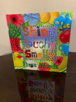 Shiny Touchy Smelly First Words Book by Sarah Phillips