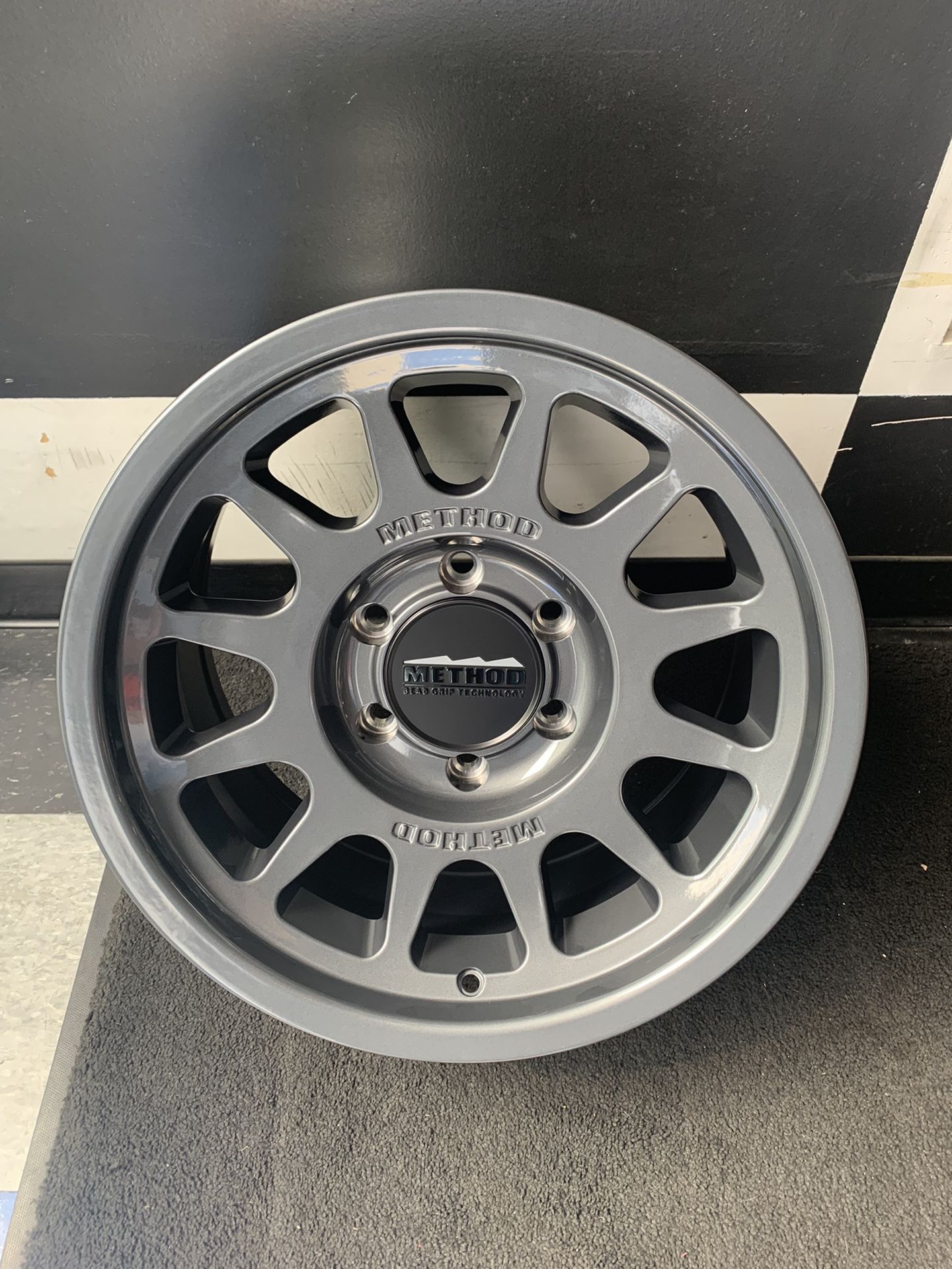 Method Race Wheels MR703, 17x8.5 - Gloss Titanium - Toyota 4Runner Tacoma Etc.