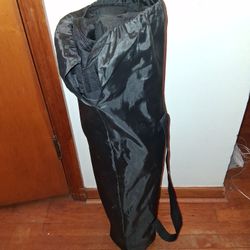 Thermal folding standing cooler with travel bag.