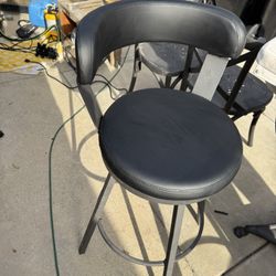 2 Metal Bar Swivel Stools 