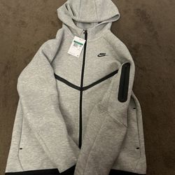 grey nike tech