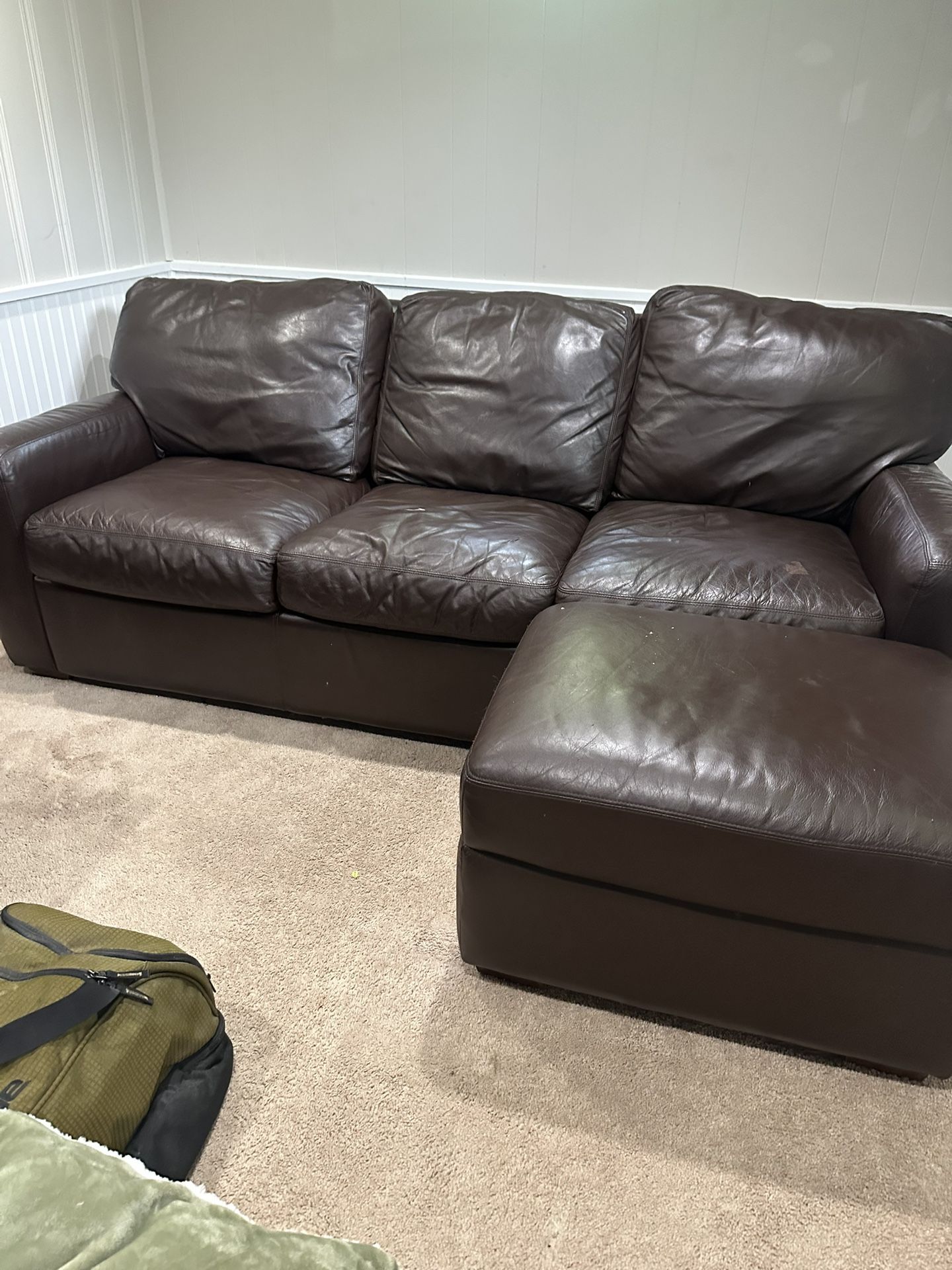 Pair of Brown Leather Couches With Pullout And Audiman