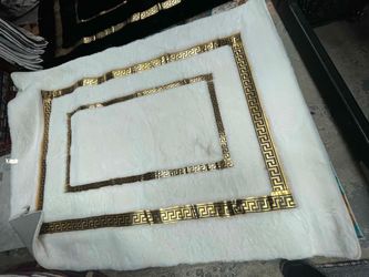 White Plush Rug with Gold Greek Key Border