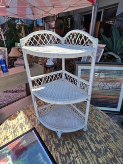 three-tier white wicker corner shelf