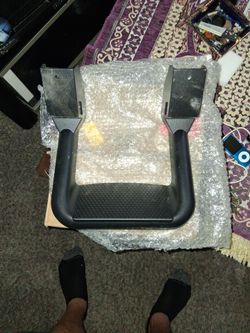 Universal side steps for a truck