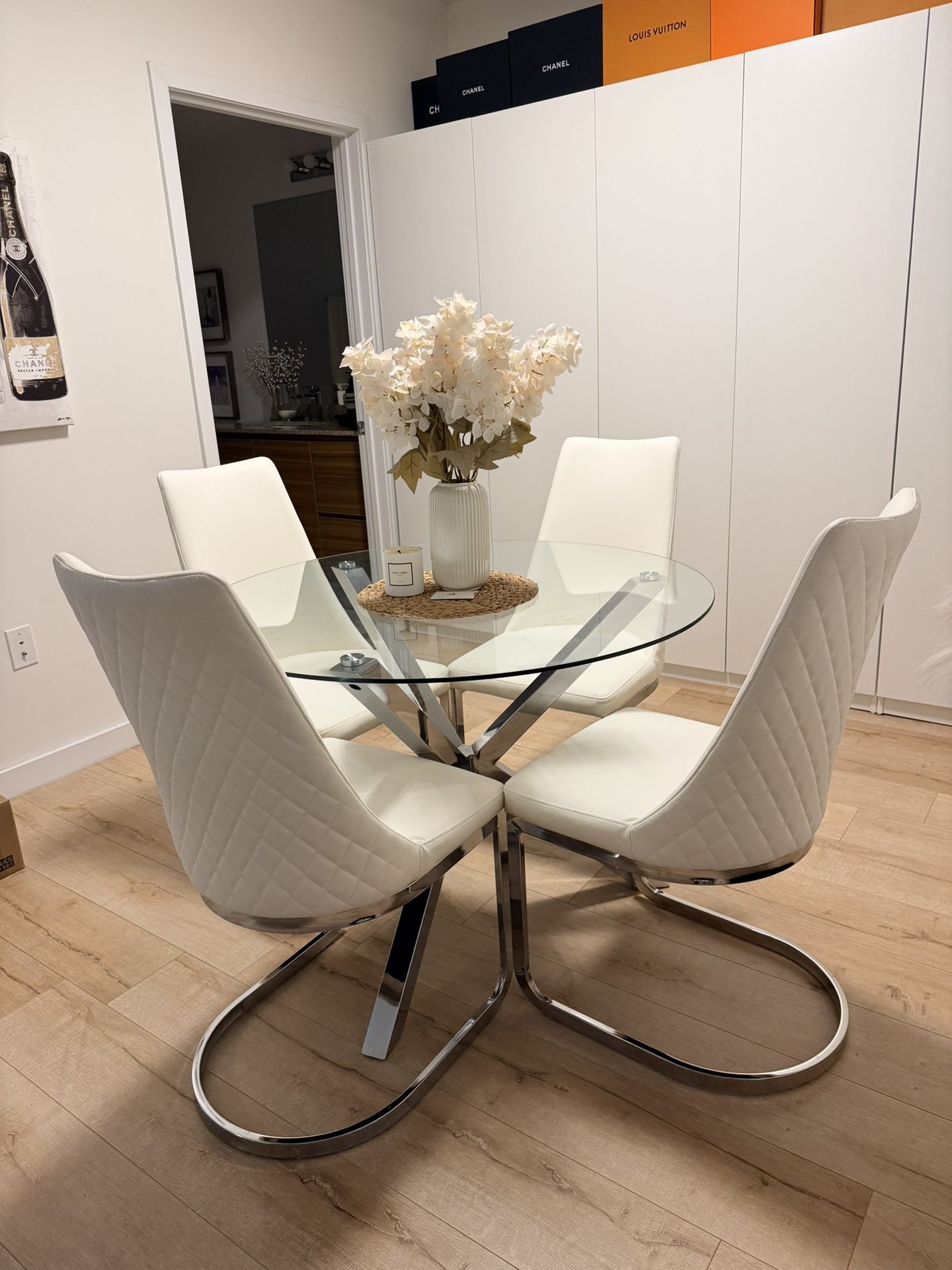 Round Glass Dining table With leather chairs