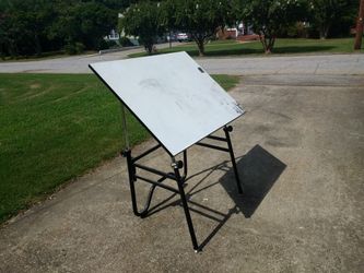 Folding drafting table