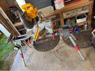 DeWalt 15amp 10-inch double-bevel sliding compound miter saw on Protool folding/rolling stand