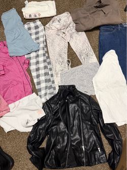Women’s clothing - 6 bags full - sizes med to large - make offer