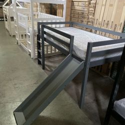 Twin bed with slide. Available in white & Grey. Assembly required.  Assembly not included.  Tax included.  Free local delivery. 

Bed only-$299
Bed wi