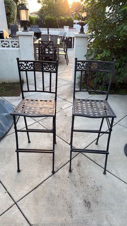 Black wrought iron chairs