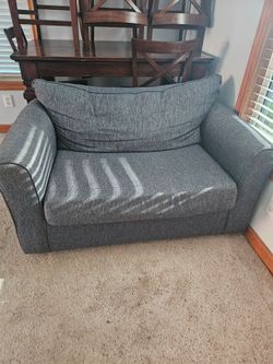 Loveseat with pull out bed.