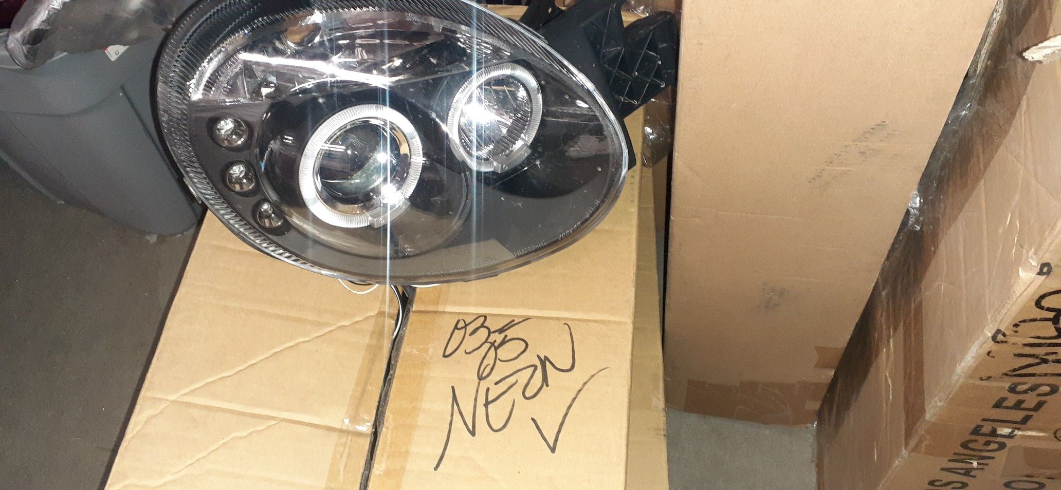 03-05 Dodge Neon headlights