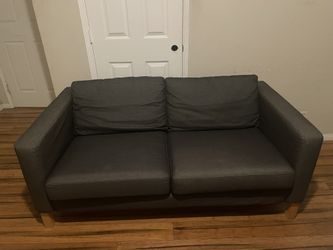 Delivery Available / Grey Loveseat