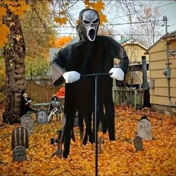 Spooky Halloween Scarecrow with Ghost Robe