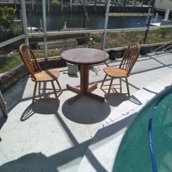 dinette table and 2 chairs. solid wood