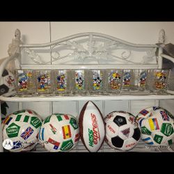 Vintage Smurf And McDonald's Cups As Well Ass Hess Soccer And Footballs Plus The Shell As Well