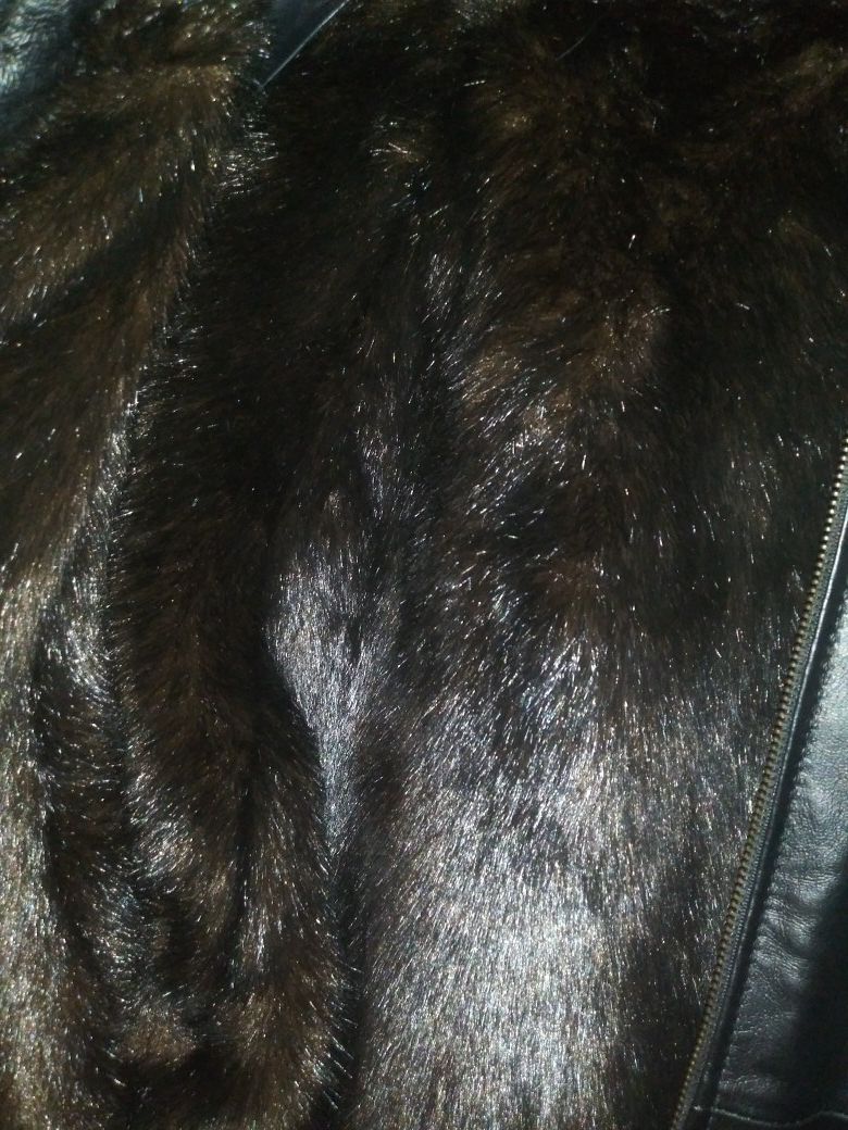 Leather coat with real fur