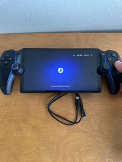 PS5 PORTAL BLACK NEVER USED BRAND NEW WITH CHARGER