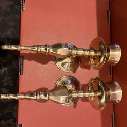 A Set Of Brass candleholder