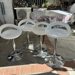 Glass Top Table & 4 Swivel Counter Stools