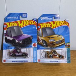 Nissan Skyline 2000GT-R LBWK & ‘94 Toyota Supra