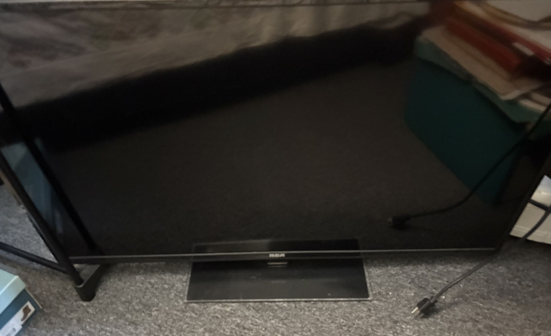 Used RCA 42 inch flatscreen TV with brand new still in box Roku express high definition streaming box Pick Up Only