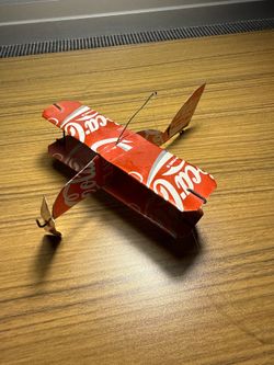 Vintage soda can airplane