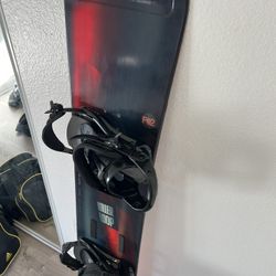 Snowboard And  Snow Goggles 