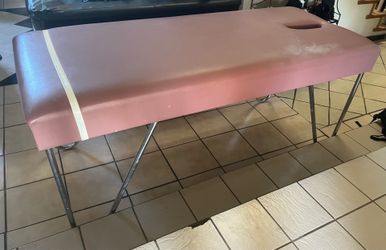 Massage table