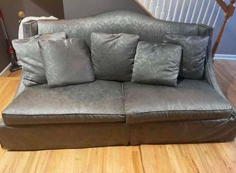 Gray Couch with a shiny finish