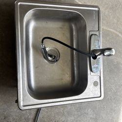Fairly new kitchen sink and faucet