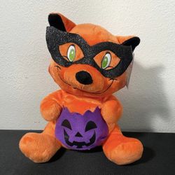 Kellytoy Halloween Raccoon  Plush Orange Black Mask Holding Purple Pumpkin Bag