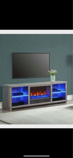 Electric fireplace/heater plus entertainment center brand new in box