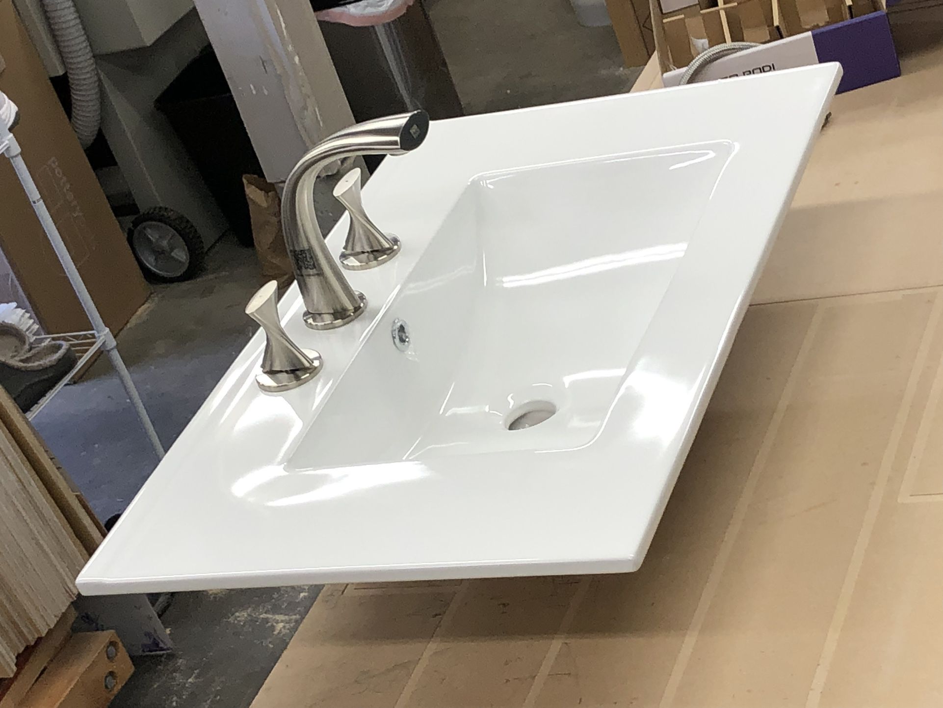 Pair Of Sinks With modern Faucet