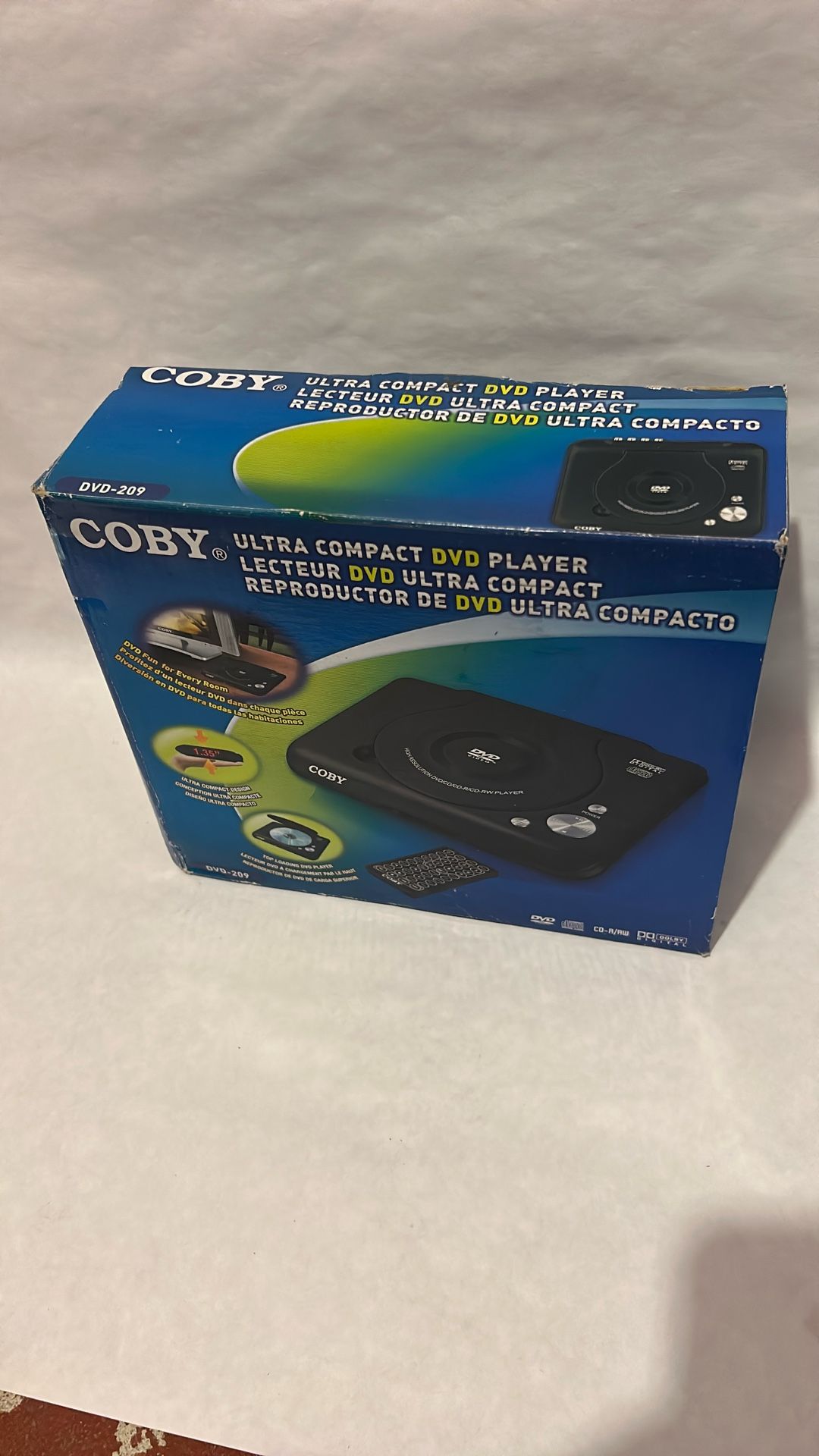 COBY Ultra Compact DVD Player (Model DVD-209)