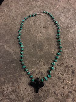Kingman turquoise along with four corners jet raven necklace