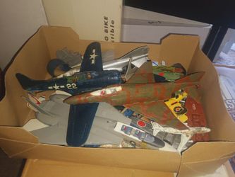 Box of loose model airplanes