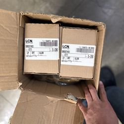 2 LCN 4111 door closer surface mounts