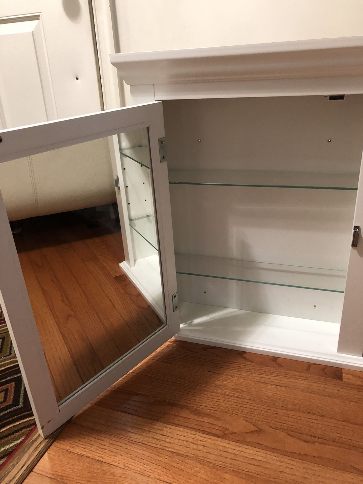 Bathroom vanity and medication shelf