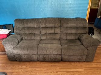 Grey couch with built in recliners